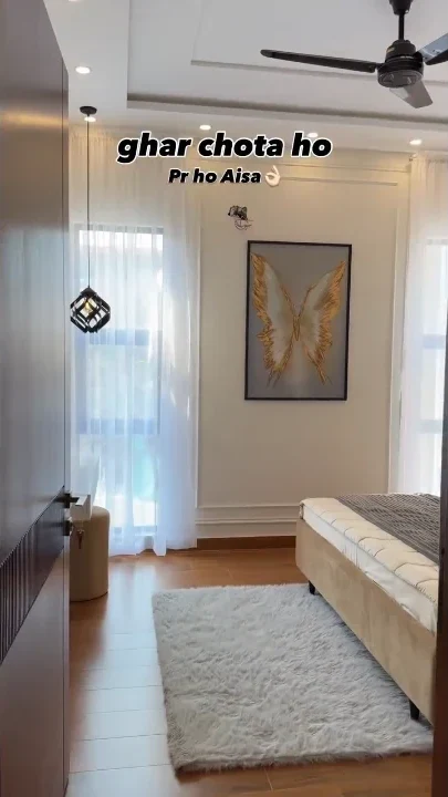 Modern bedroom suite with designer drop pendant lights and butterfly art Patna