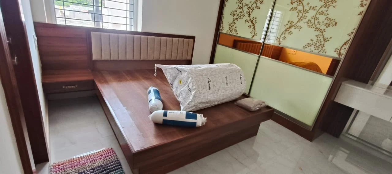 Solid teakwood bed with fluted wooden headboard and sliding wardrobe Patna