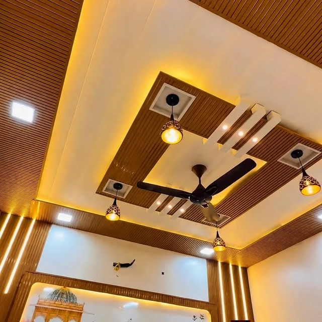 Wood slatted modern false ceiling with warm pendant lighting Patna