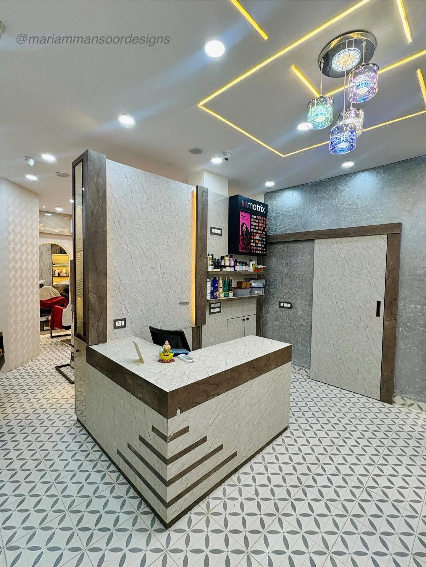 Luxury commercial reception desk with backlit marble front and brass accents Patna