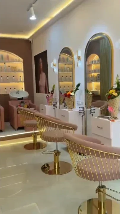 Luxury beauty salon and styling studio interior with warm backlit mirrors Patna