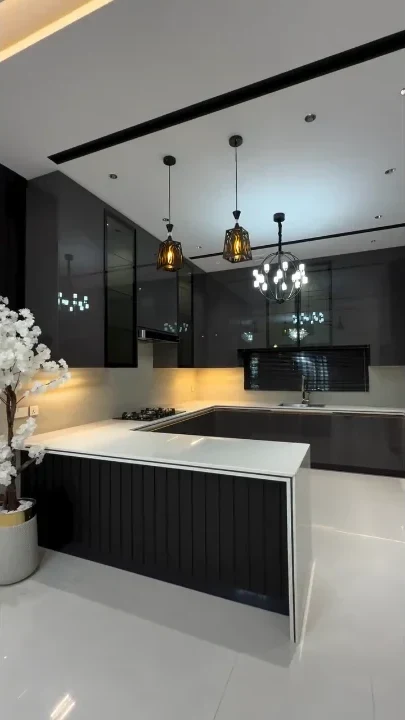 U-shaped modern modular kitchen with fluted wooden island breakfast counter Patna