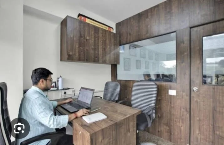 Modern director executive cabin with ergonomic workstations and acoustic paneling Patna